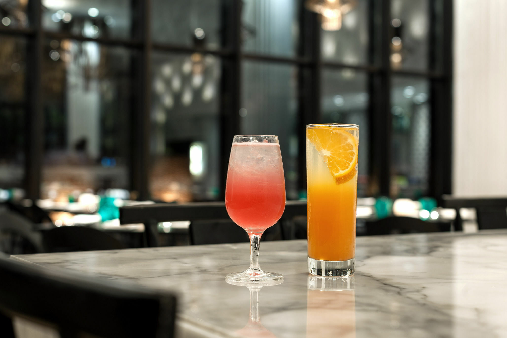 Hyatt Centric Candolim Goa المظهر الخارجي الصورة A pink and an orange cocktail